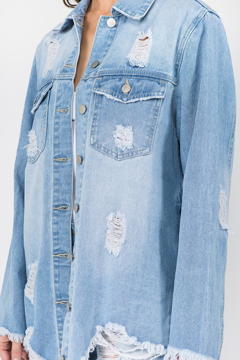 Distressed frayed hem denim jacket with raw hem and vintage-inspired look, featuring button closure, ideal for casual outings