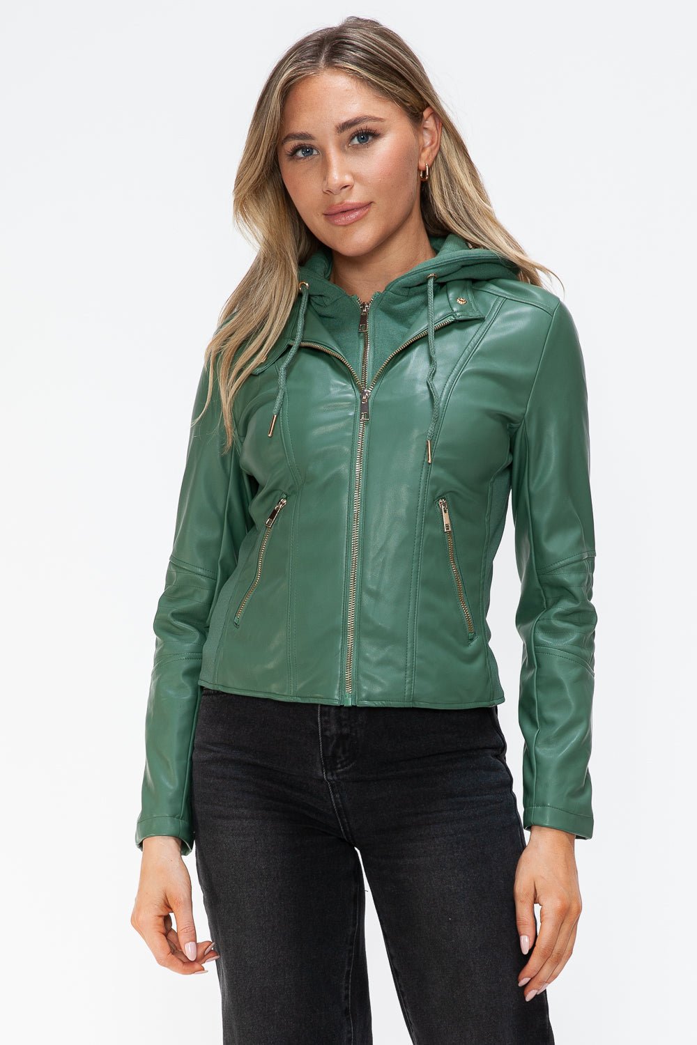 Green faux leather zip-up hooded jacket with drawstring and pockets, worn by a model against a white background.