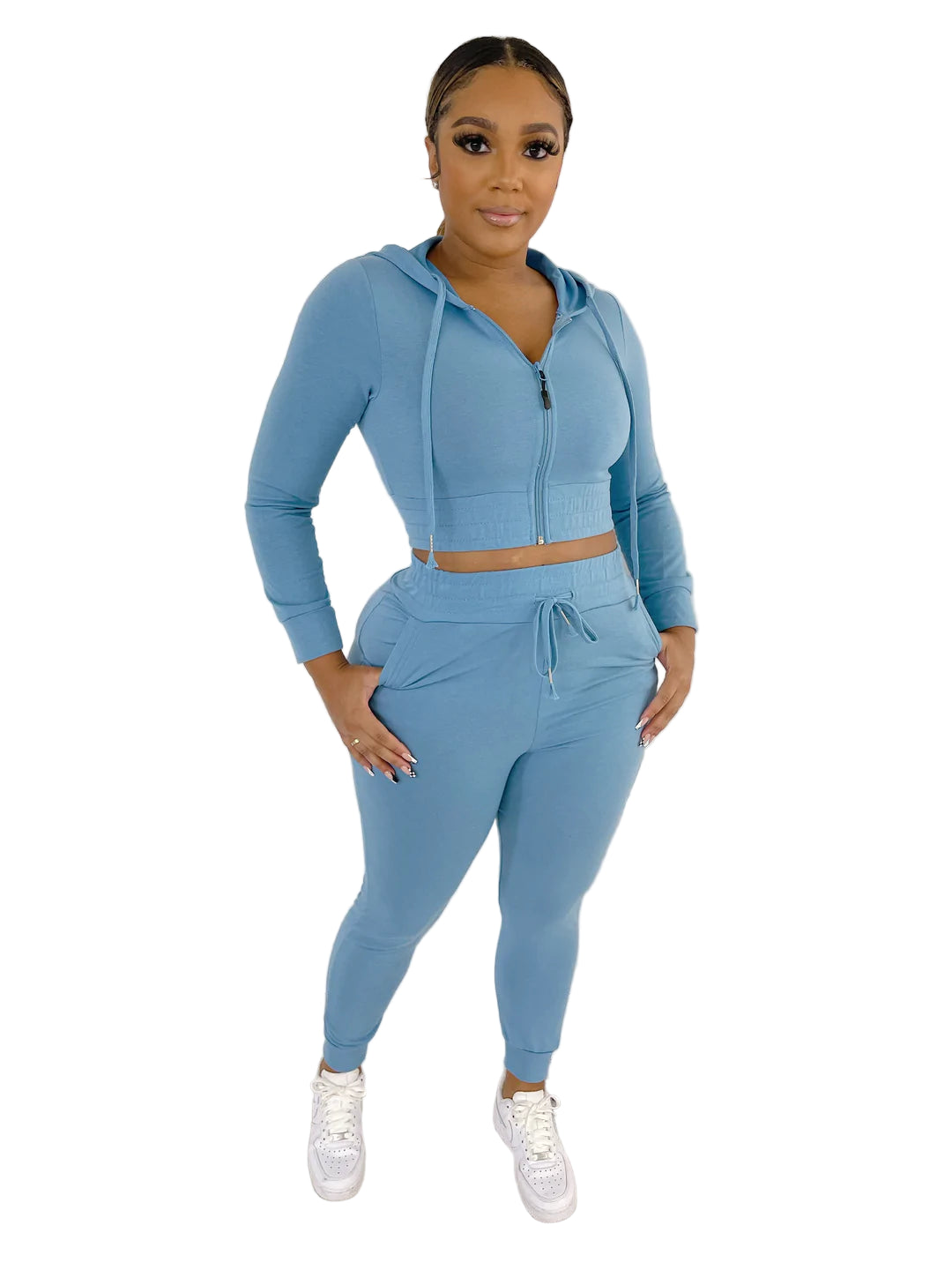 Woman wearing a light blue French Terry Jacket & Pants Set made of polyester and spandex, ideal for casual style and comfort.