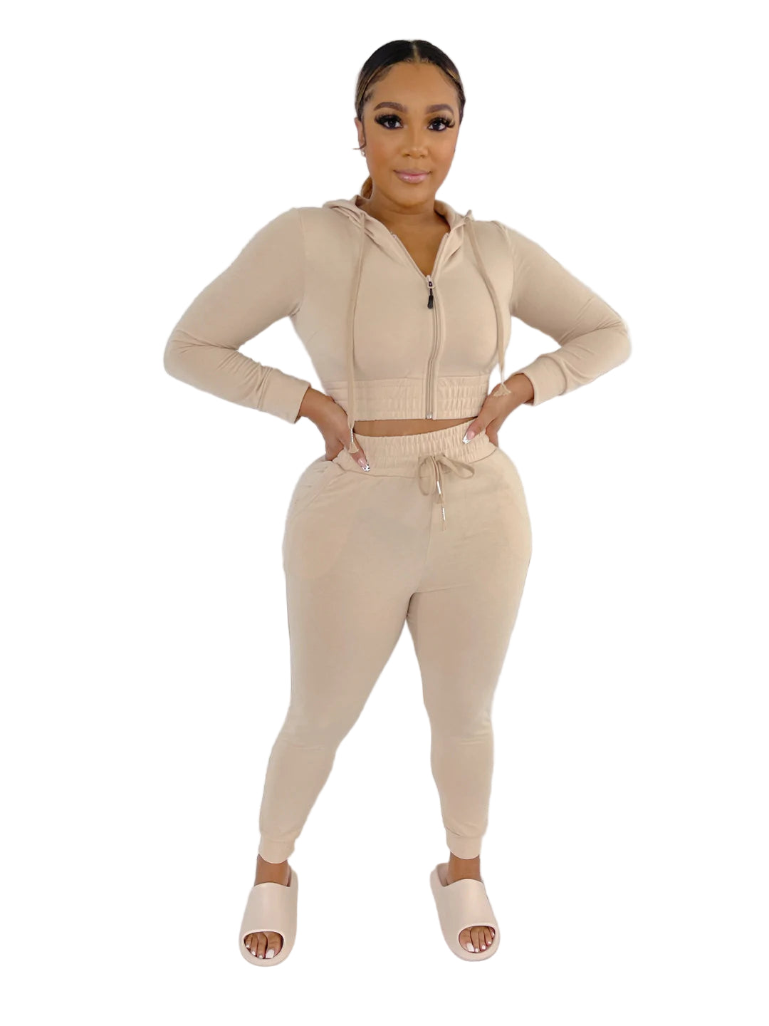 Woman wearing beige French Terry Jacket & Pants Set, stylish and comfortable outfit, made of polyester and spandex blend.