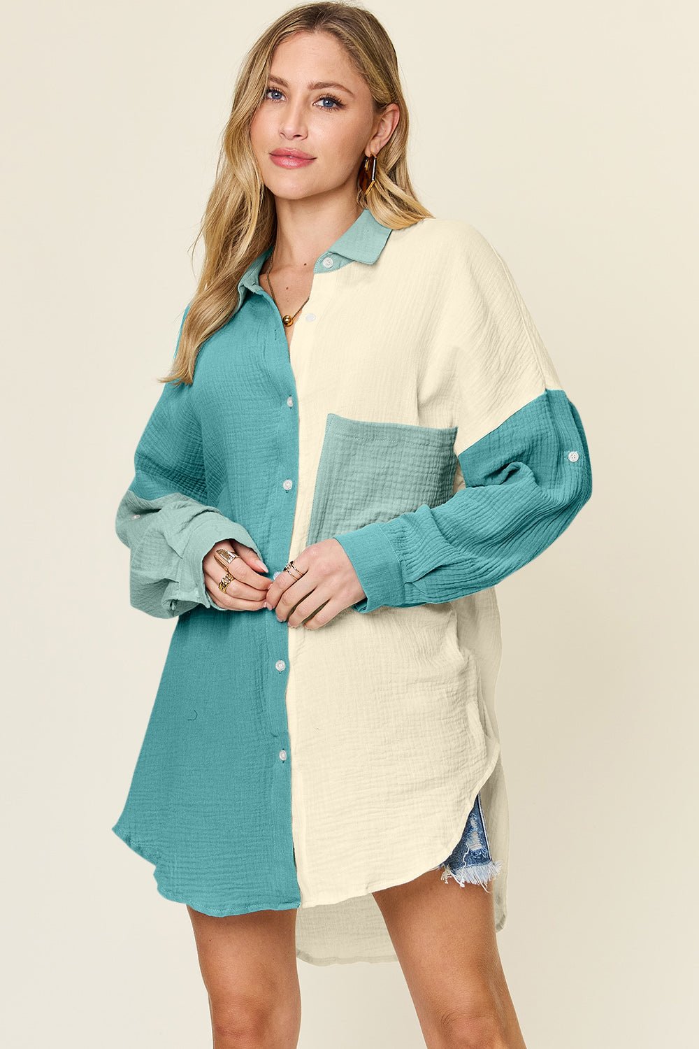 Full size pocketed texture button up shirt in teal and cream, featuring buttoned front and slight stretch, made of 100% cotton.