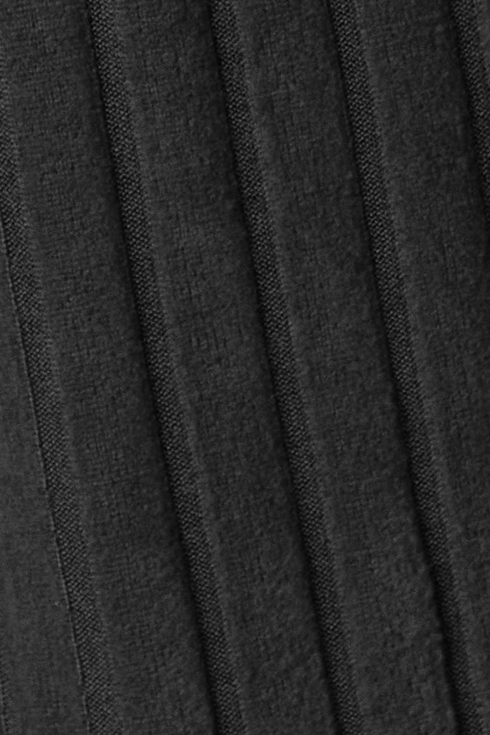 Close-up of black hooded sweater cardigan fabric texture showing opaque and slightly stretchy material.
