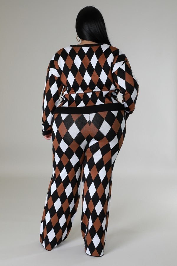 Long sleeve black stretch two-piece pant set with V-cut, high-waisted pants, and button closure in a diamond pattern design. Sizes 1XL-3XL.