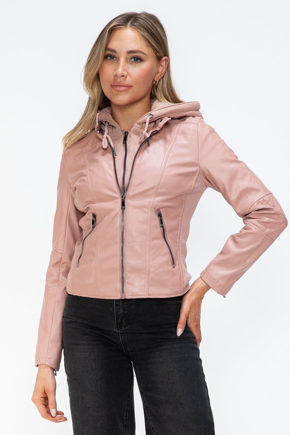 Mauve faux leather zip-up jacket with drawstring hood, featuring pockets, modeled with black jeans.
