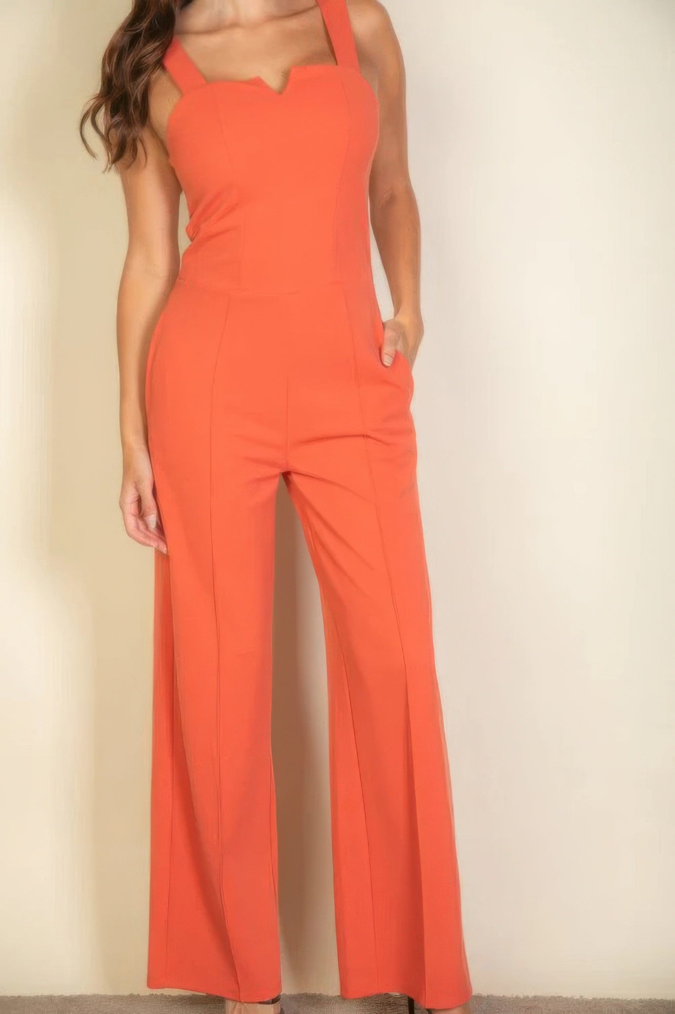 Notched Neck Cami Jumpsuit in vibrant orange with flattering fit and modern neckline, perfect for a chic and sophisticated look.