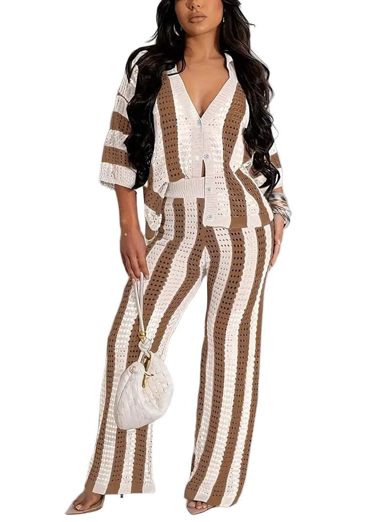 Woman wearing Sassy Stripe Two-Piece Set with V-neck top and wide-leg pants, featuring casual stripes in premium viscose fabric.