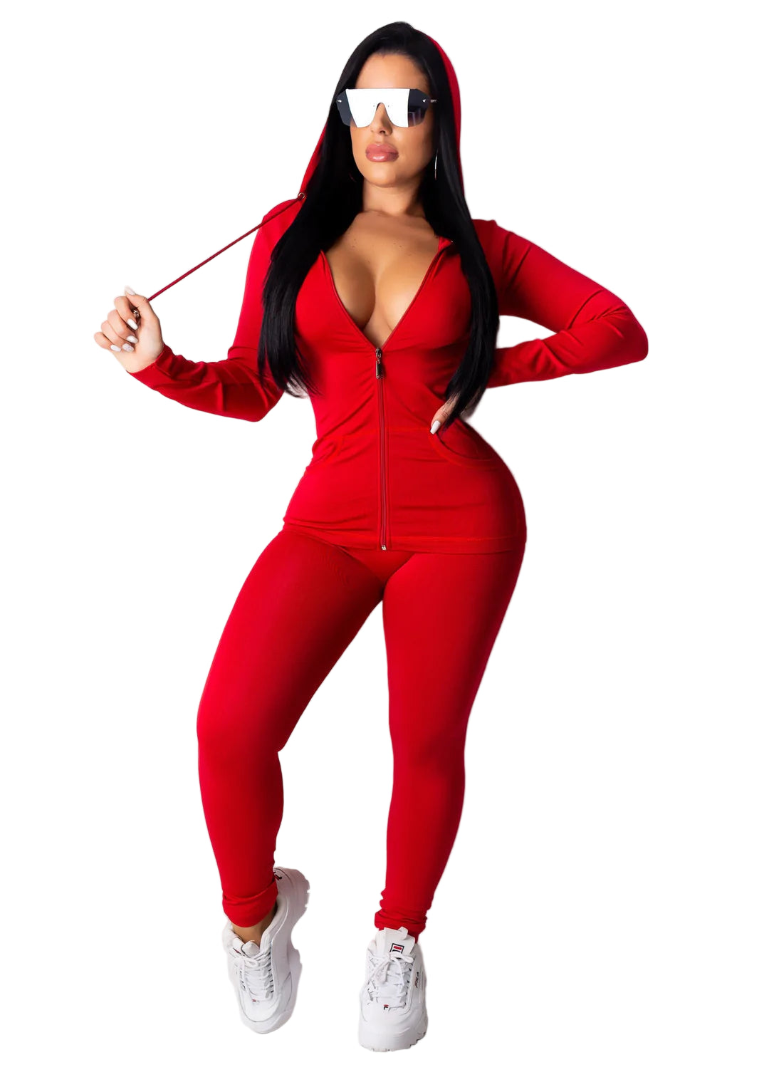 Woman wearing a red solid hoodie leggings set with sunglasses and sneakers, featuring a zip-up front. 92% polyester, 8% spandex.