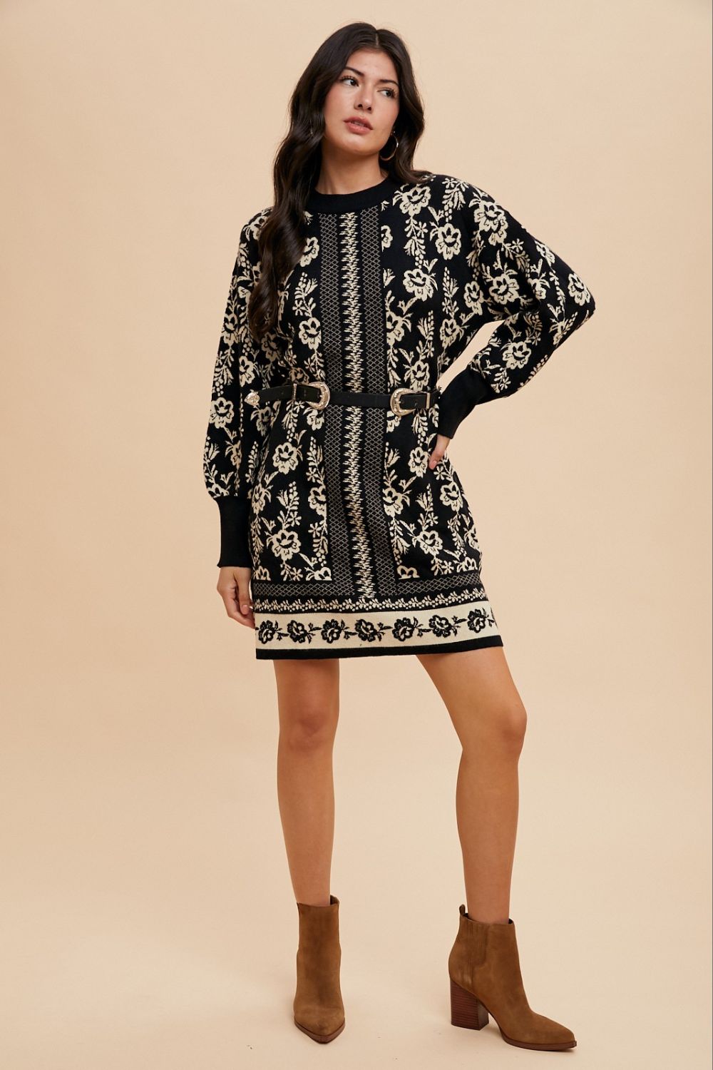 Woman wearing a Faith Floral Jacquard Round Neck Sweater Dress with intricate patterns, slightly stretchy, viscose blend material.