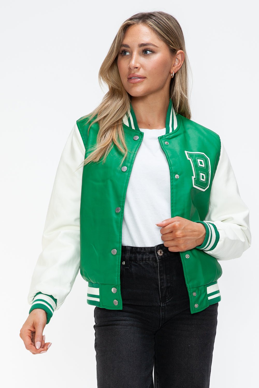Green PU leather bomber jacket with white sleeves, contrast snap-down, and letter patch, worn by a woman in a casual style.