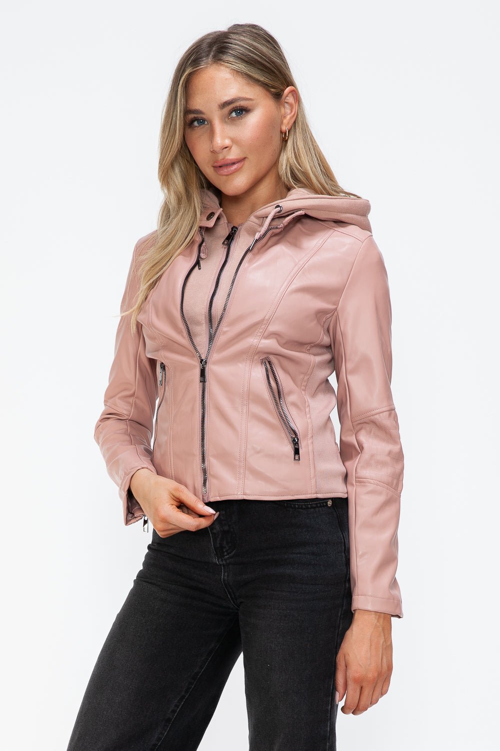 Mauve faux leather zip-up jacket with drawstring hood, worn by a model. Features pockets, basic style, and pleather material.