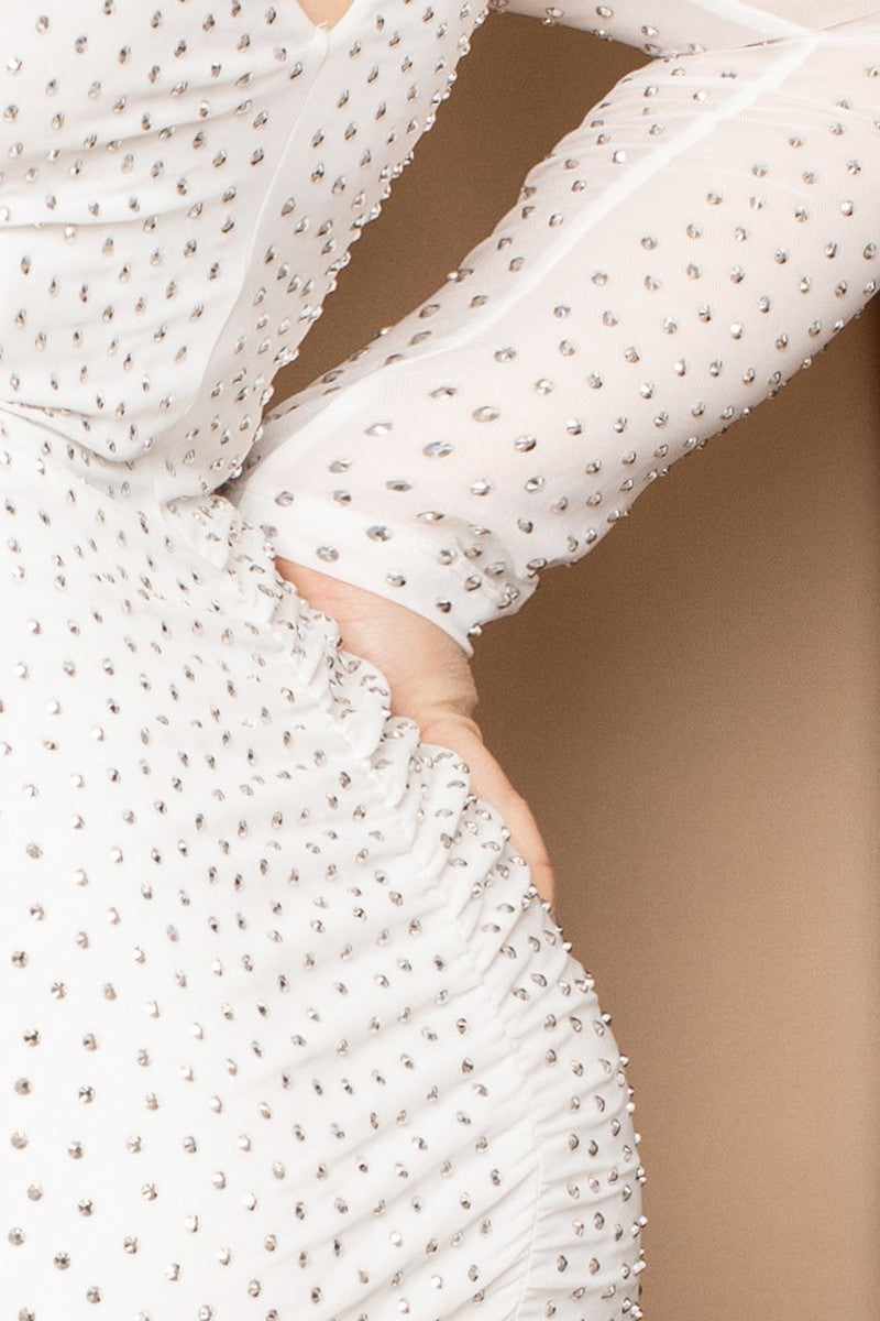 Plus size ivory midi dress with translucent silver rhinestones and sheer sleeves, featuring a V-shape back and back slit hem.
