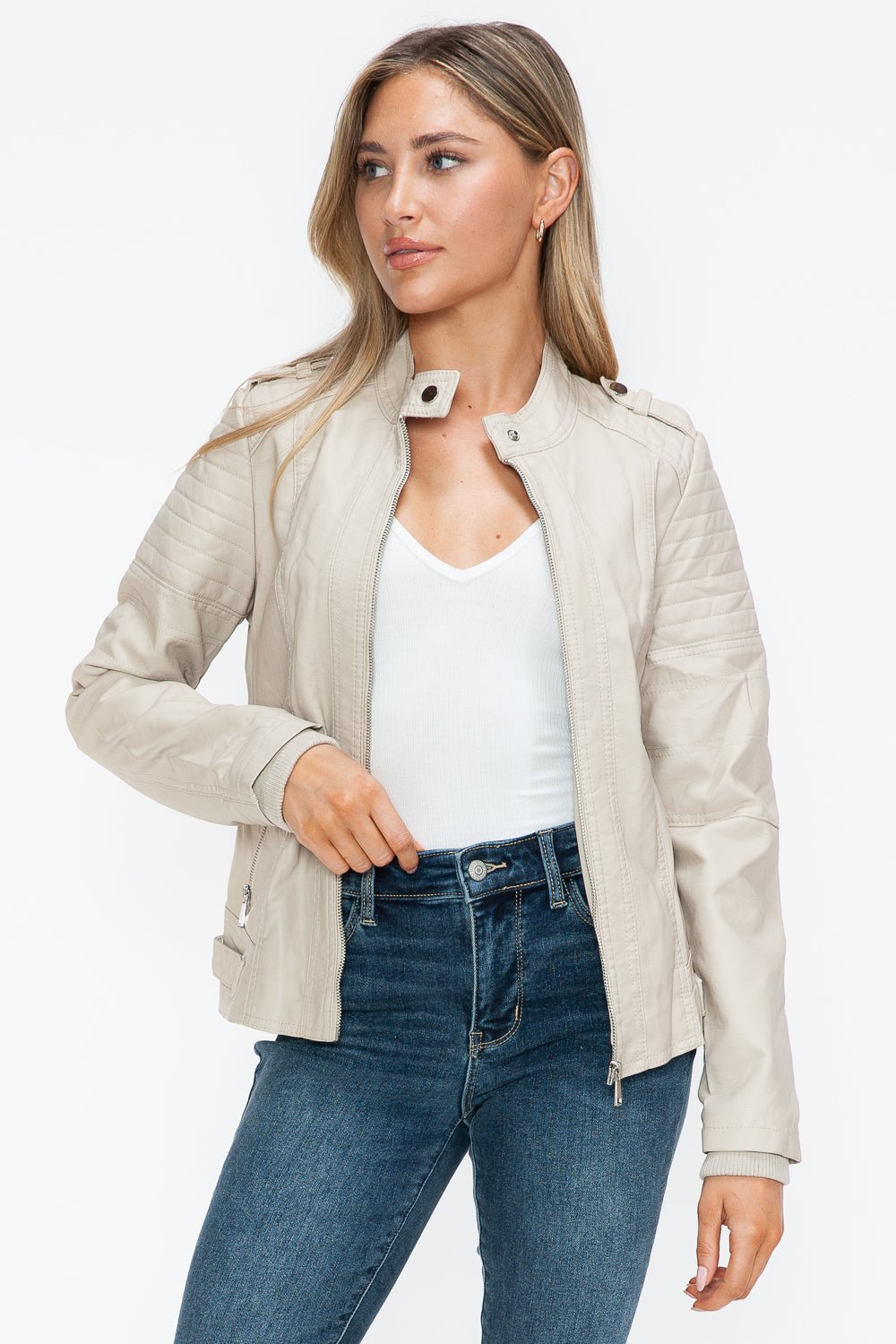 Sand PU leather biker jacket with side zip pockets, featuring a basic style and normal thickness, worn by model with casual outfit.