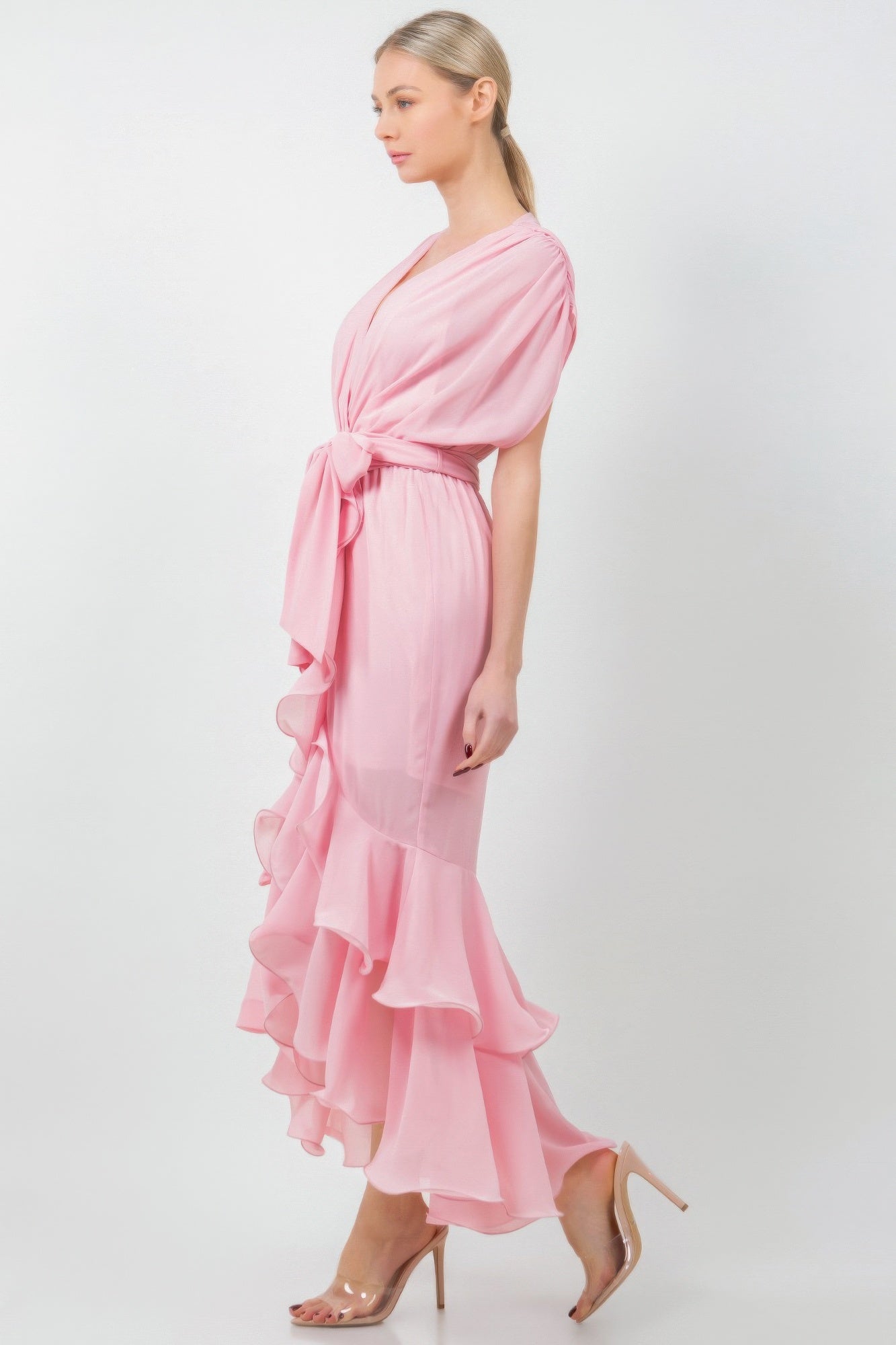 Mauve solid tie waist ruffle midi dress on model, showcasing elegant feminine style with custom fit and flowing fabric.