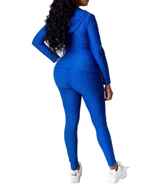 Woman modeling Baddie With Body Brazil Two-Piece Set in blue, made from polyester and spandex, featuring a textured design.