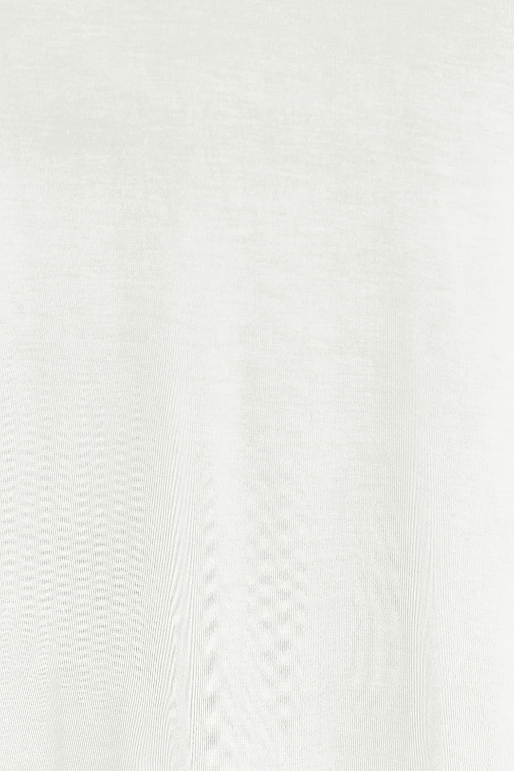 Close-up of fabric texture showing the slightly stretchy, opaque material of a V-Neck Lantern Sleeve Top, 95% rayon, 5% spandex.